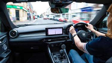 Auto Express pictures editor Dawn Grant driving the Alfa Romeo Tonale PHEV